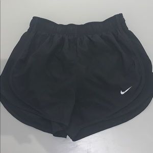 Black Nike running shorts
